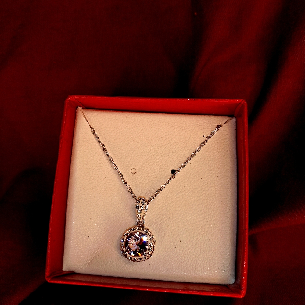 Beautiful pink and silver pendant on silver chain